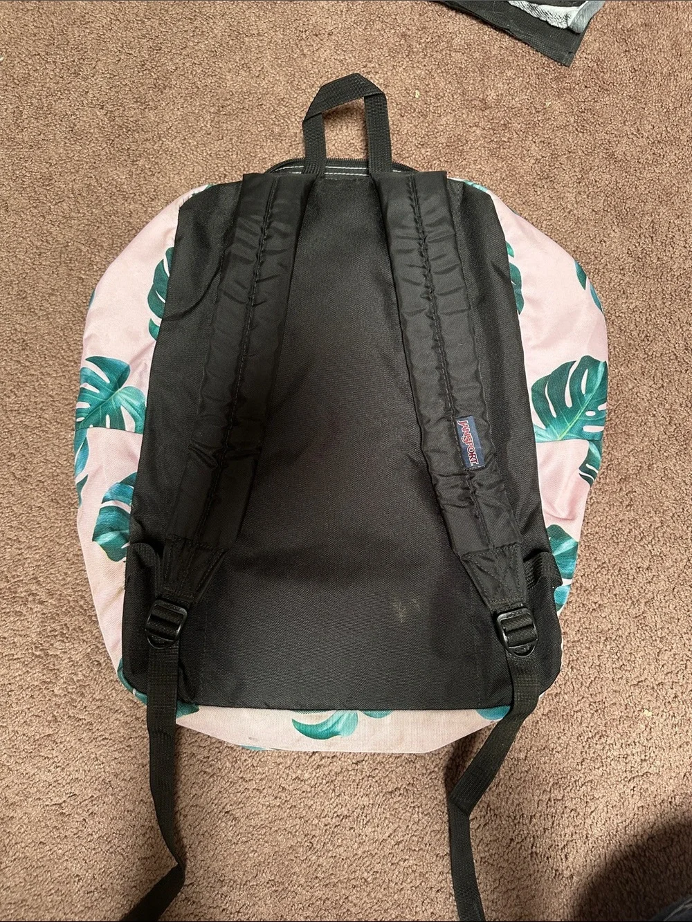 Jansport Pink Backpack with Green Tropical Leaf Print